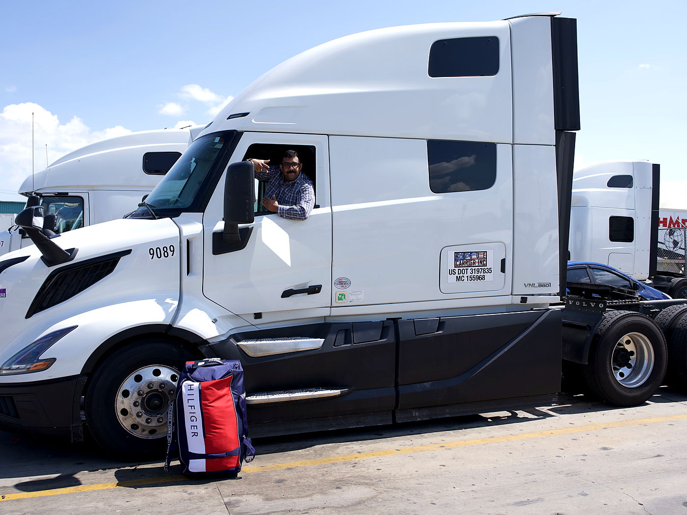 A Rogue Carrier driver leaning out of his cab in the yard