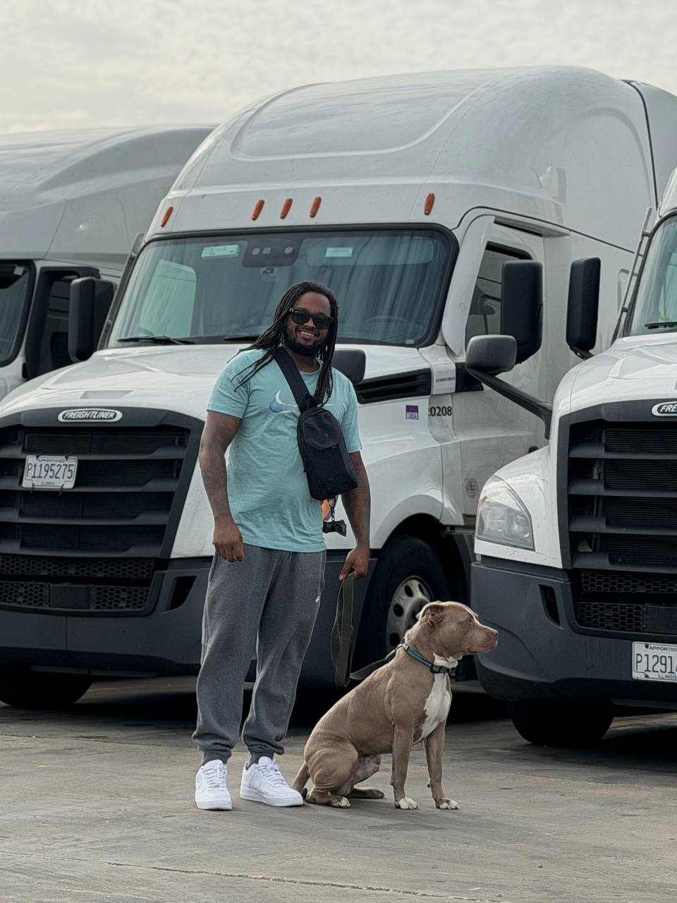 Rogue Carrier driver with his companion on the road