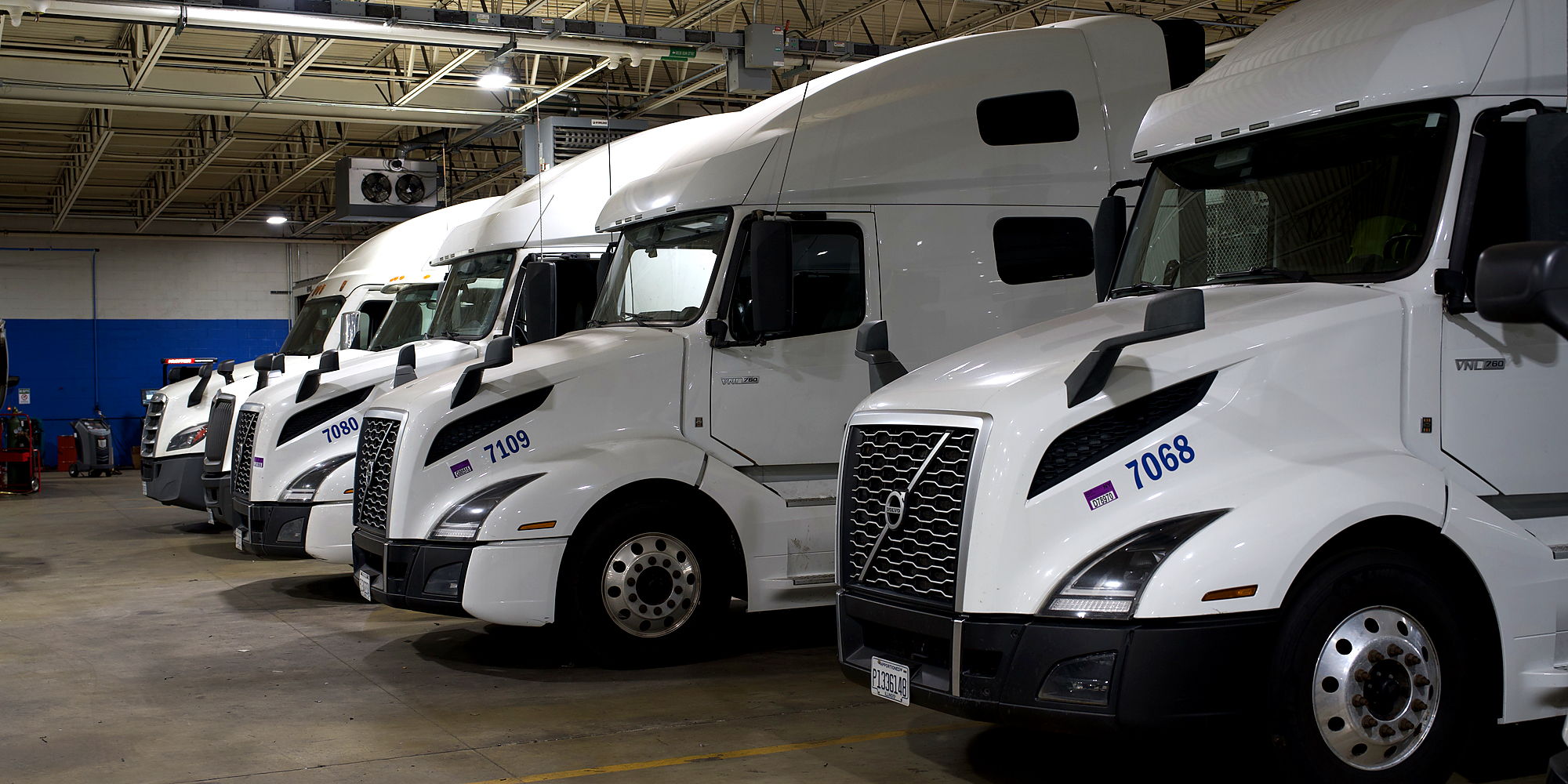 Rogue Carrier tractors lined up in the shop